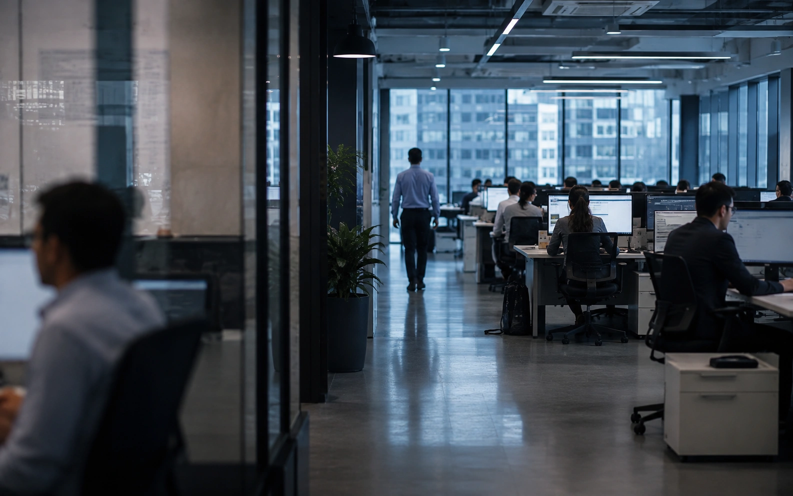 An enterprise operations floor where teams work alongside AI-assisted workflows.